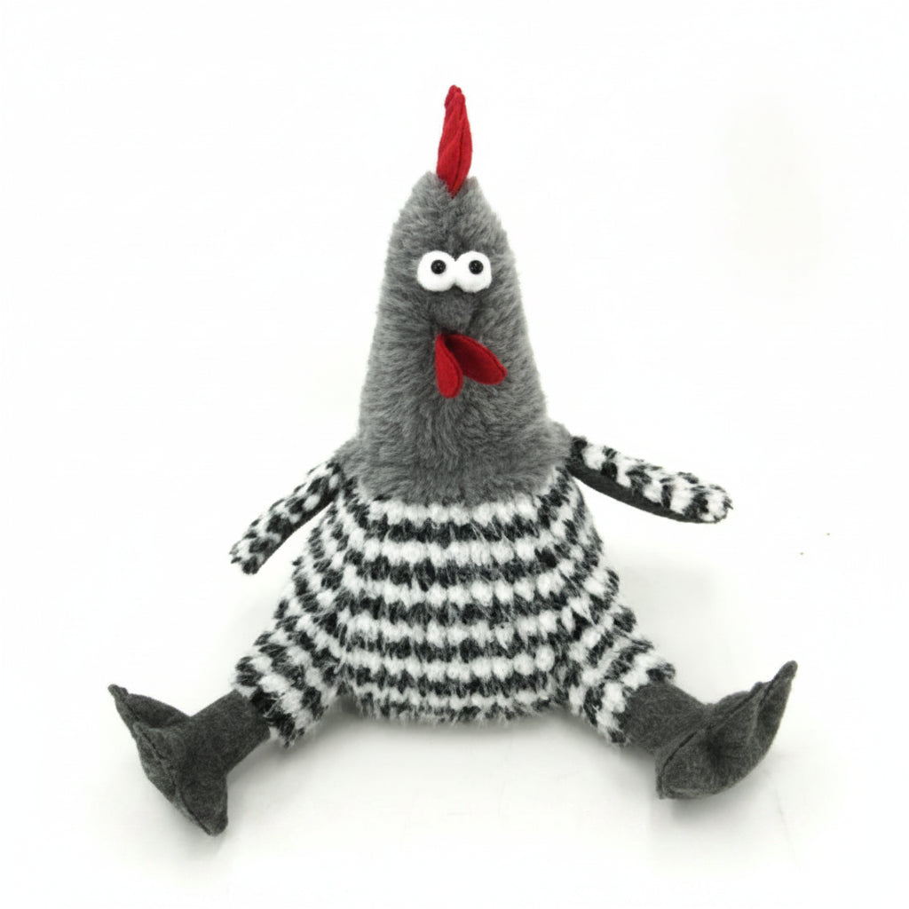 A handmade plush toy chicken made from a gray knit sock, featuring black and white striped knit body and legs, a red knit comb, and a red knit wattle. It has large white eyes with black pupils.